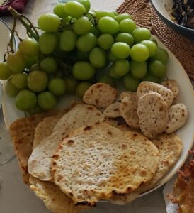 unleavened bread and grapes for Maundy Thursday