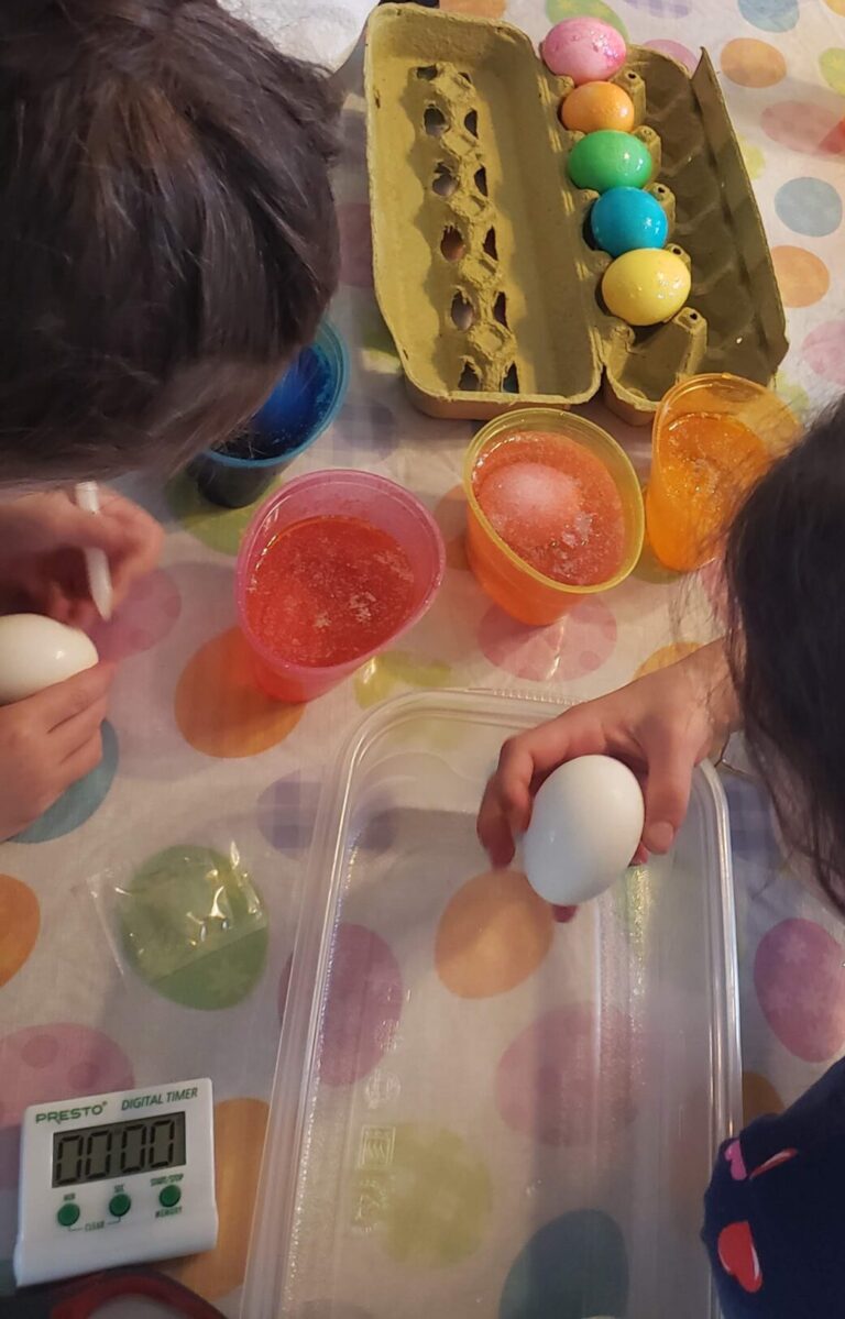 Kids dying Easter Eggs